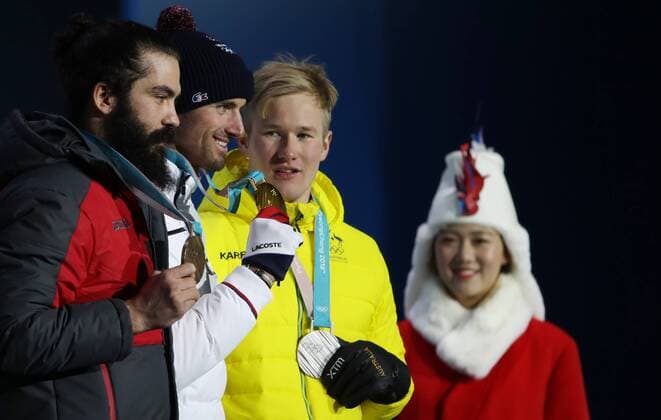 OLYMPICS - 2018 Winter Olympics PYEONGCHANG,SOUTH KOREA,15.FEB.18 - OLYMPICS, SNOWBOARDING - Olympic Winter games Winterspiele Spiele Summer games PyeongChang 2018, Medals Plaza, snowboard cross, men, award ceremony. Image shows Jarryd Hughes (AUS), Pierre Vaultier (FRA) and Regino Hernandez (ESP). Keywords: medal. GEPAxpictures xAndreasxPranter