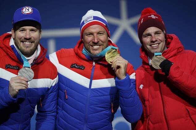 OLYMPICS - 2018 Winter Olympics PYEONGCHANG,SOUTH KOREA,15.FEB.18 - OLYMPICS, ALPINE SKIING - Olympic Winter games Winterspiele Spiele Summer games PyeongChang 2018, medal plaza, downhill, men, award ceremony. Image shows Kjetil Jansrud (NOR), Aksel Lund Svindal (NOR) and Beat Feuz (SUI). Keywords: medal. GEPAxpictures xAndreasxPranter