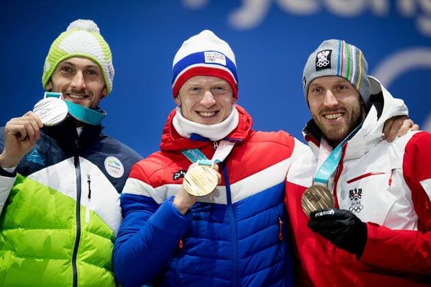 180216 Jakov Fak of Slovenia silver Johannes Thingnes B ¿of Norway gold and Dominik LANDERTINGER of Austria bronze celebrate at a Medal Ceremony for Men s Biathlon 20 km during day seven of the 2018 Winter Olympics on February 16 2018 in Pyeongchang Photo Jon Olav Nesvold BILDBYR N code JE 160172  Copyright: JONxOLAVxNESVOLD BB180216JE064