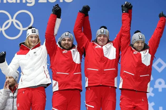 OLYMPICS - 2018 Winter Olympics PYEONGCHANG,SOUTH KOREA,16.FEB.18 - OLYMPICS, LUGE - Olympic Winter games Winterspiele Spiele Summer games PyeongChang 2018, Medals Plaza, team relay, award ceremony. Image shows the rejoicing of Madeleine Egle, David Gleirscher, Peter Penz and Georg Fischler (AUT). GEPAxpictures xMathiasxMandl