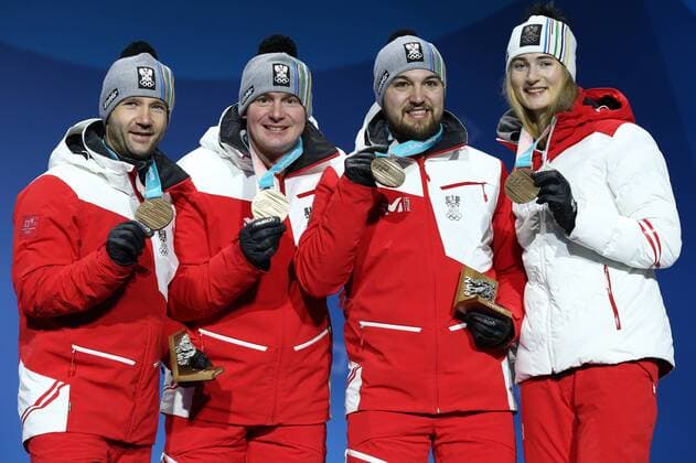 OLYMPICS - 2018 Winter Olympics PYEONGCHANG,SOUTH KOREA,16.FEB.18 - OLYMPICS, LUGE - Olympic Winter games Winterspiele Spiele Summer games PyeongChang 2018, Medals Plaza, team relay, award ceremony. Image shows the rejoicing of Georg Fischler, Peter Penz, David Gleirscher and Madeleine Egle (AUT). keywords: medal. GEPAxpictures xMathiasxMandl