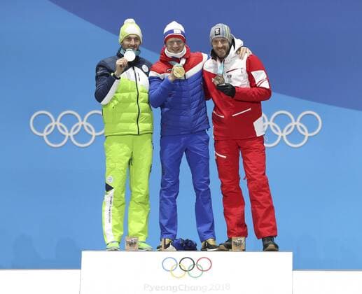 (180216) -- PYEONGCHANG, Feb. 16, 2018 -- Champion Norway s Johannes Thingnes Boe (C), second-placed Slovenia s Jakov Fak (L) and third-placed Austria s Dominik Landertinger pose for photos during medal ceremony of men s 20km individual event of biathlong at 2018 PyeongChang Winter Olympic Games Olympische Spiele Olympia OS at Medal Plaza, PyeongChang, South Korea, Feb. 16. 2018. ) (SP)OLY-SOUTH KOREA-PYEONGCHANG-BIATHLON-MEN S 20KM INDIVIDUAL-MEDAL CEREMONY BaixXuefei 