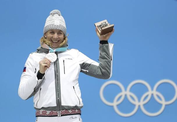 (180216) -- PYEONGCHANG, Feb. 16, 2018 -- Silver medalist Anastasiya Kuzmina from Slovakia poses for photos during medal ceremony of the women s 15km individual of biathlon at the 2018 PyeongChang Winter Olympic Games Olympische Spiele Olympia OS at Medal Plaza, PyeongChang, South Korea, Feb. 16. 2018. ) (SP)OLY-SOUTH KOREA-PYEONGCHANG-BIATHLON-WOMEN S 15KM INDIVIDUAL-MEDAL CEREMONY BaixXuefei 
