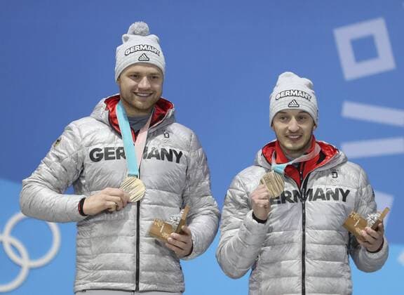 (180216) -- PYEONGCHANG, Feb. 16, 2018 -- Third-Placed Toni Eggert (L) and Sascha Benecken from Germany pose for photos during medal ceremony of men s doubles event of luge at 2018 PyeongChang Winter Olympic Games Olympische Spiele Olympia OS at Medal Plaza, PyeongChang, South Korea, Feb. 16, 2018. Bai Xufei) (SP)OLY-SOUTH KOREA-PYEONGCHANG-LUGE-MEN S DOUBLES-MEDAL CEREMONY BaixXuefei 