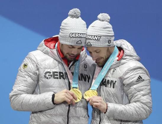 (180216) -- PYEONGCHANG, Feb. 16, 2018 -- Champion Tobias Wendl (L) and Tobias Arlt from Germany react during medal ceremony of men s doubles event of luge at 2018 PyeongChang Winter Olympic Games Olympische Spiele Olympia OS at Medal Plaza, PyeongChang, South Korea, Feb. 16, 2018. Bai Xufei) (SP)OLY-SOUTH KOREA-PYEONGCHANG-LUGE-MEN S DOUBLES-MEDAL CEREMONY BaixXuefei 