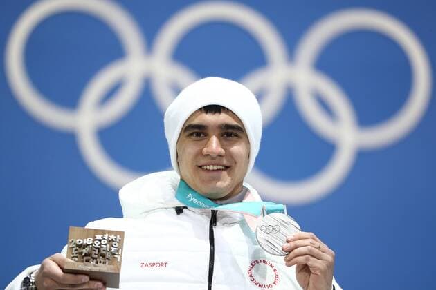 PYEONGCHANG, SOUTH KOREA - FEBRUARY 16, 2018: Silver medalist, Olympic Athlete from Russia Nikita Tregubov celebrates during a victory ceremony for the men s skeleton event at the 2018 Winter Olympic Games Olympische Spiele Olympia OS at Medal Plaza. Valery Sharifulin TASS  TS074322