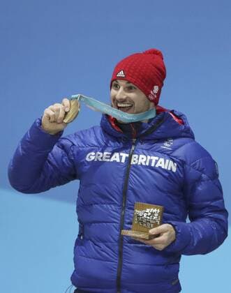 (180216) -- PYEONGCHANG, Feb. 16, 2018 -- Bronze medalist Dom Parsons of Britain poses for photos during medal ceremony of the men s skeleton at 2018 PyeongChang Winter Olympic Games Olympische Spiele Olympia OS at Medal Plaza, PyeongChang, South Korea, Feb. 16, 2018. ) (SP)OLY-SOUTH KOREA-PYEONGCHANG-MEN S SKELETON-MEDAL CEREMONY BaixXuefei 