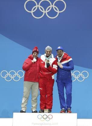 (180216) -- PYEONGCHANG, Feb. 16, 2018 -- Gold medalist Matthias Mayer of Austria (C), Silver medalist Beat Feuz of Switzerland (L) and bronze medalist Kjetil Jansrud of Norway pose for photos during medal ceremony of men s super giant slalom of Alpine Skiing at the 2018 PyeongChang Winter Olympic Games Olympische Spiele Olympia OS at Medal Plaza, PyeongChang, South Korea, on Feb. 16, 2018. ) (SP)OLY-SOUTH KOREA-PYEONGCHANG-MEN S SUPER-G-MEDAL CEREMONY BaixXuefei 