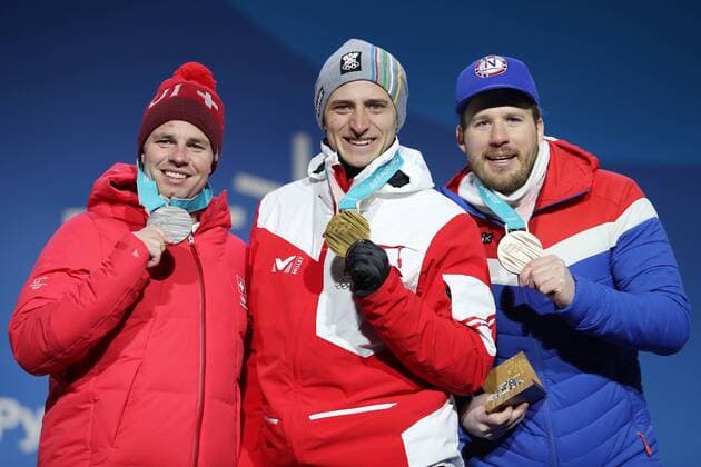 OLYMPICS - 2018 Winter Olympics PYEONGCHANG,SOUTH KOREA,16.FEB.18 - OLYMPICS, ALPINE SKIING - Olympic Winter games Winterspiele Spiele Summer games PyeongChang 2018, Medals Plaza, Super G, men, award ceremony. Image shows Beat Feuz (SUI), Matthias Mayer (AUT) and Kjetil Jansrud (NOR). GEPAxpictures xMathiasxMandl