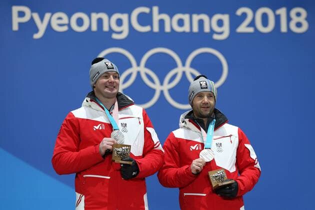 OLYMPICS - 2018 Winter Olympics PYEONGCHANG,SOUTH KOREA,16.FEB.18 - OLYMPICS,LUGE - Olympic Winter games Winterspiele Spiele Summer games PyeongChang 2018, Medals Plaza, Doubles, award ceremony. Image shows Peter Penz, Georg Fischler (AUT). GEPAxpictures xMathiasxMandl