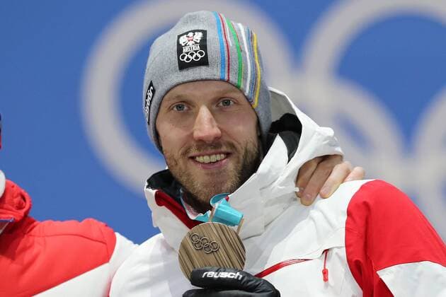 OLYMPICS - 2018 Winter Olympics PYEONGCHANG,SOUTH KOREA,16.FEB.18 - OLYMPICS,BIATHLON - Olympic Winter games Winterspiele Spiele Summer games PyeongChang 2018, Medals Plaza, 20km biathlon, men, award ceremony. Image shows Dominik Landertinger (AUT). GEPAxpictures xMathiasxMandl