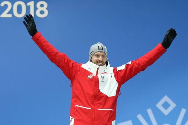 OLYMPICS - 2018 Winter Olympics PYEONGCHANG,SOUTH KOREA,16.FEB.18 - OLYMPICS,BIATHLON - Olympic Winter games Winterspiele Spiele Summer games PyeongChang 2018, Medals Plaza, 20km biathlon, men, award ceremony. Image shows Dominik Landertinger (AUT). GEPAxpictures xMathiasxMandl