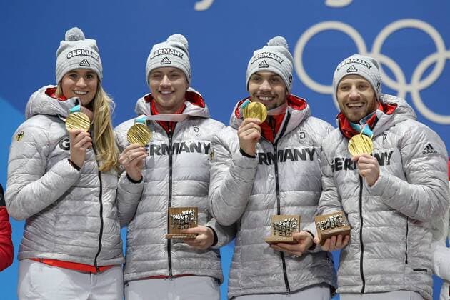 OLYMPICS - 2018 Winter Olympics PYEONGCHANG,SOUTH KOREA,16.FEB.18 - OLYMPICS,LUGE - Olympic Winter games Winterspiele Spiele Summer games PyeongChang 2018, Medals Plaza, team relay, award ceremony. Image shows Natalie Geisenberger, Johannes Ludwig, Tobias Wendl and Tobias Arlt (GER). GEPAxpictures xMathiasxMandl