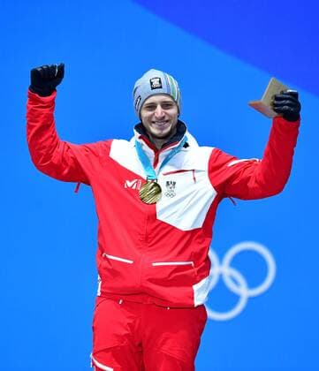 Gold medalist Austria s Matthias Mayer celebrates during the medal ceremony for Men s Alpine Super-G at the Pyeongchang 2018 Winter Olympics in Pyeongchang, South Korea, on February 16, 2018.  OLY20180216348 KEVINxDIETSCH