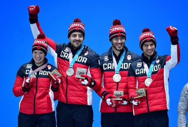 Silver medalist Canada s Alex Gough, Sam Edney, Tristan Walker and Justin Snith, celebrate during the medal ceremony for Luge Team Relay at the Pyeongchang 2018 Winter Olympics in Pyeongchang, South Korea, on February 16, 2018.  OLY20180216354 KEVINxDIETSCH