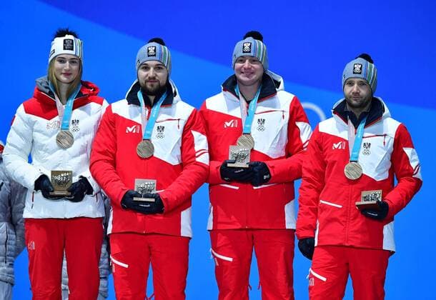 Bronze medalist Austria s Madeleine Egle, David Gleirscher, Peter Penz and Georg Fischler pose during the medal ceremony for Luge Team Relay at the Pyeongchang 2018 Winter Olympics in Pyeongchang, South Korea, on February 16, 2018.  OLY20180216355 KEVINxDIETSCH