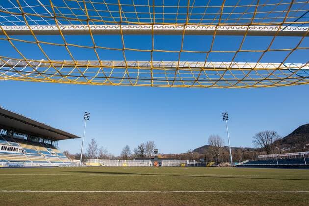 Construction of the new flood light poles in the Ernst Abbe sports field home stadium of FC Carl Zeiss Jena on 16 February 2018 views in direction of the marathon gate with 2 new flood light poles along main stand left and back straight right Ernst Abbe spor field