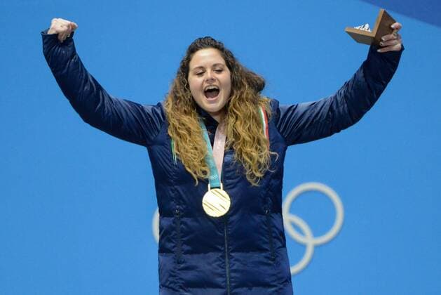 February 16, 2018 - Pyeongchang, South Korea - MICHELA MOIOLI of Italy celebrates getting the gold medal in the Ladies Snowboard Cross event in the PyeongChang Olympic Games Olympische Spiele Olympia OS Pyeongchang 18: Medal Winners - ZUMAl132 20180216_zap_l132_079 Copyright: xChristopherxLevyx