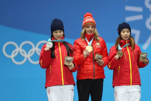 (180217) -- PYEONGCHANG, Feb. 17, 2018 -- Champion Hanna Huskova of Belarus (C), second-placed Zhang Xin of China (L) and third-placed Kong Fanyu of China pose for photos during the medal ceremony of ladies aerials of freestyle skiing at 2018 PyeongChang Winter Olympic Games Olympische Spiele Olympia OS at the Medal Plaza in PyeongChang, South Korea, on Feb. 17, 2018. ) (SP)OLY-SOUTH KOREA-PYEONGCHANG-FREESTYLE SKIING-LADIES AERIALS-MEDAL CEREMONY WuxZhuang 