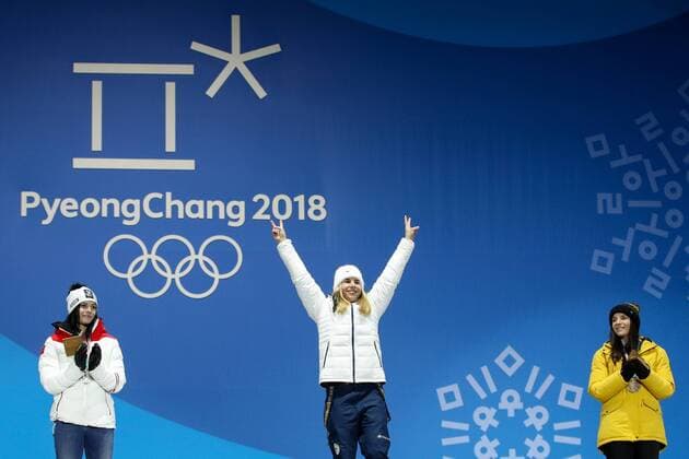 OLYMPICS - 2018 Winter Olympics PYEONGCHANG,SOUTH KOREA,17.FEB.18 - OLYMPICS, ALPINE SKIING - Olympic Winter games Winterspiele Spiele Summer games PyeongChang 2018, Medals Plaza, Super G, ladies, award ceremony. Image shows Anna Veith (AUT), the rejoicing of Ester Ledecka (CZE) and Tina Weirather (LIE). GEPAxpictures xMaticxKlansek