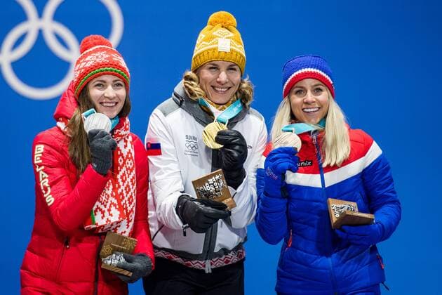 180218 Darya Domarcheva of Belarus Silver Anastasiya Kuzmina of Slovakia Gold Marte Olsbu of Norway Bronze celebrating at a Medal Ceremony for Women s 12 5 km Mass Start during day nine of the 2018 Winter Olympics on February 18 2018 in Pyeongchang Photo Petter Arvidson PA BILDBYRAN code 91980  Copyright: PETTERxARVIDSON BB180218PA133
