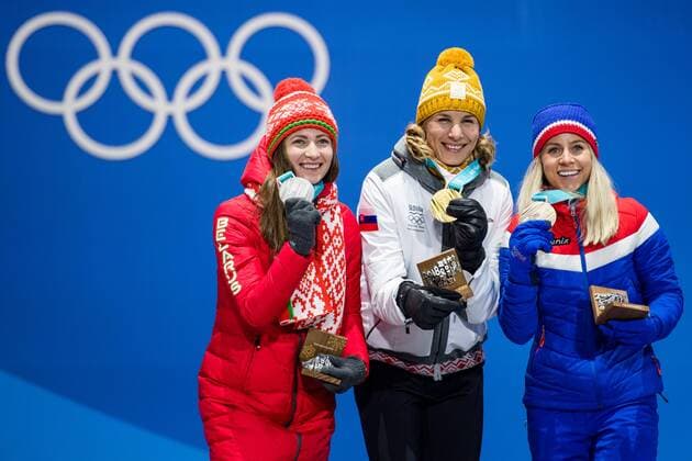 180218 Darya Domarcheva of Belarus Silver Anastasiya Kuzmina of Slovakia Gold Marte Olsbu of Norway Bronze celebrating at a Medal Ceremony for Women s 12 5 km Mass Start during day nine of the 2018 Winter Olympics on February 18 2018 in Pyeongchang Photo Petter Arvidson PA BILDBYRAN code 91980  Copyright: PETTERxARVIDSON BB180218PA134