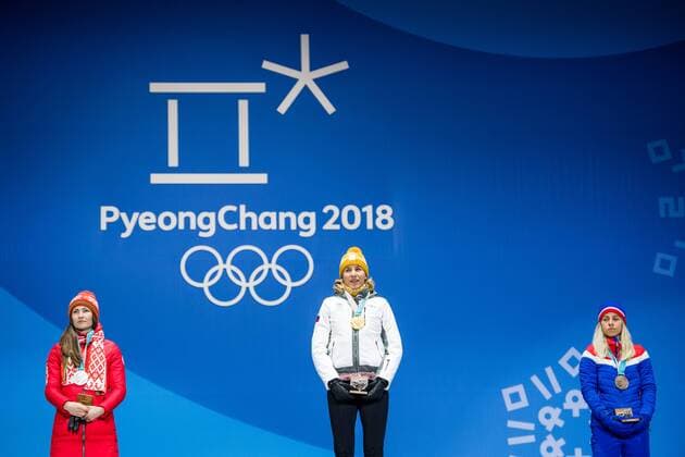 180218 Darya Domarcheva of Belarus Silver Anastasiya Kuzmina of Slovakia Gold Marte Olsbu of Norway Bronze celebrating at a Medal Ceremony for Women s 12 5 km Mass Start during day nine of the 2018 Winter Olympics on February 18 2018 in Pyeongchang Photo Petter Arvidson PA BILDBYRAN code 91980  Copyright: PETTERxARVIDSON BB180218PA135