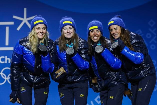 PyeongChang 2018 - Langlauf, 4x5km Staffel Damen Siegerehrung PYEONGCHANG, SOUTH KOREA - FEBRUARY 18, 2018: Silver medalists Stina Nilsson, Ebba Andersson, Charlotte Kalla, and Anna Haag (L-R) of Sweden pose at a victory ceremony for the ladies cross-country skiing 4x5km relay race at the 2018 Winter Olympic Games Olympische Spiele Olympia OS at the Alpensia Cross-Country Skiing Centre. Valery Sharifulin TASS  TS0747C8