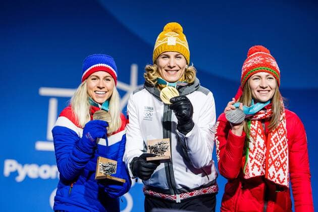 180218 Marte Olsbu of Norway Bronze Anastasiya Kuzmina of Slovakia Gold Darya Domarcheva of Belarus Silver celebrating at a Medal Ceremony for Women s 12 5 km Mass Start during day nine of the 2018 Winter Olympics on February 18 2018 in Pyeongchang Photo Petter Arvidson BILDBYR N code PA 91980  Copyright: PETTERxARVIDSON BB180218PA141