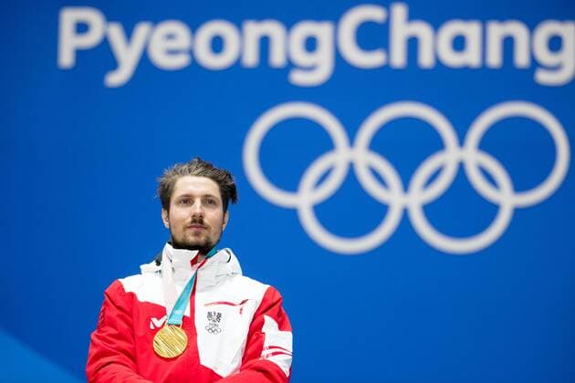 PyeongChang 2018 - Ski Alpin, Riesenslalom Herren Siegerehrung OLYMPICS - 2018 Winter Olympics PYEONGCHANG,SOUTH KOREA,18.FEB.18 - OLYMPICS, ALPINE SKIING - Olympic Winter games Winterspiele Spiele Summer games PyeongChang 2018, Medals Plaza, giant slalom, men, award ceremony. Image shows Marcel Hirscher (AUT). Keywords: medal. GEPAxpictures xMaticxKlansek