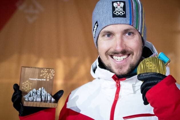 Olympia-Bilder des Tages - SPORT PyeongChang 2018 - Ski Alpin, Riesenslalom Herren Siegerehrung OLYMPICS - 2018 Winter Olympics PYEONGCHANG,SOUTH KOREA,18.FEB.18 - OLYMPICS, ALPINE SKIING - Olympic Winter games Winterspiele Spiele Summer games PyeongChang 2018, Medals Plaza, giant slalom, men, award ceremony. Image shows Marcel Hirscher (AUT). Keywords: medal. GEPAxpictures xMaticxKlansek