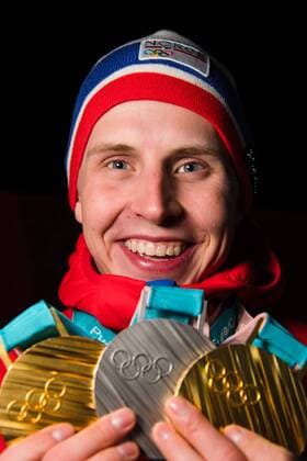 180218 Simen Hegstad Krüger of Norway celebrates with his medals after the Medal Ceremony for the Men s 4 x 10 km Relay during day nine of the 2018 Winter Olympics on February 18 2018 in Pyeongchang Photo Petter Arvidson BILDBYR N code PA 91980  Copyright: PETTERxARVIDSON BB180218PA180
