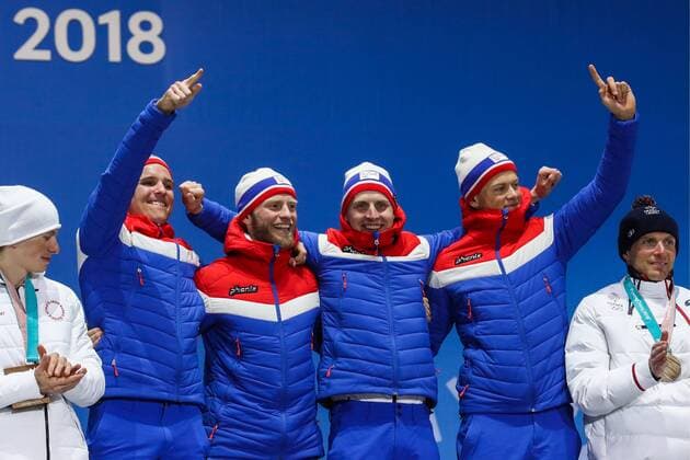 PyeongChang 2018 - Langlauf, 4x10km Staffel Herren Siegerehrung PYEONGCHANG, SOUTH KOREA - FEBRUARY 18, 2018: Silver medalist, Olympic Athlete from Russia Denis Spitsov, gold medalists Didrik Toenseth, Martin Johnsrud Sundby, Simen Hegstad Krueger, Johannes Hoesflot Klaebo of Norway, and bronze medalist Clement Parisse (L-R) of France pose at a victory ceremony for the men s cross-country skiing 4x10km relay race at the 2018 Winter Olympic Games Olympische Spiele Olympia OS at the Alpensia Cross-Country Skiing Centre. Valery Sharifulin TASS  TS0747FD