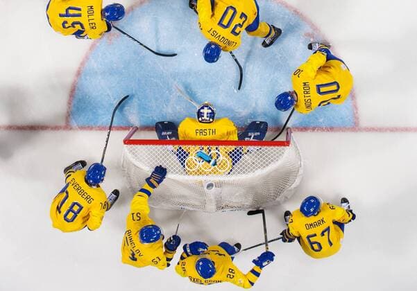 180218 Sweden s players gather around goaltender Viktor Fasth prior to the Men s Preliminary Round game between Sweden and Finland during day nine of the 2018 Winter Olympics on February 18 2018 in Pyeongchang Photo Joel M BILDBYR N code JM 87635  Copyright: JOELxMARKLUND BB180218JM132