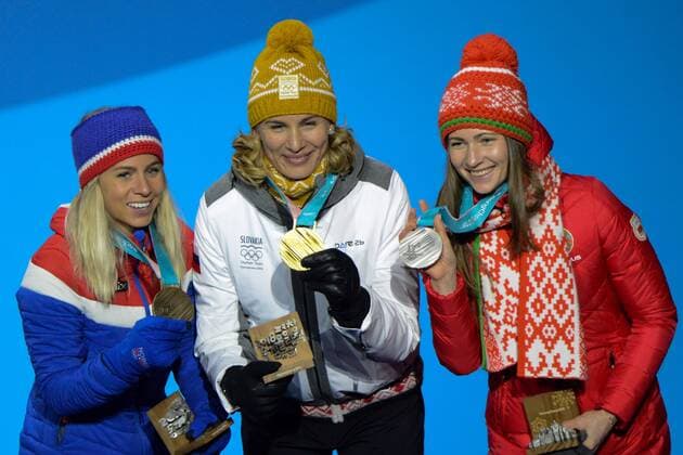 February 18, 2018 - Pyeongchang, South Korea - DARYA DOMRACHEVA of Belarus (left) , ANASTASIYA KUZMINA of Slovakia (center) and TIRIL ECKHOFF of Norway with their medals from the Women s 12.5km Mass Start Biathlon event in the PyeongChang Olympic Games Olympische Spiele Olympia OS Pyeongchang 18: Medal Winners - ZUMAl132 20180218_zap_l132_089 Copyright: xChristopherxLevyx