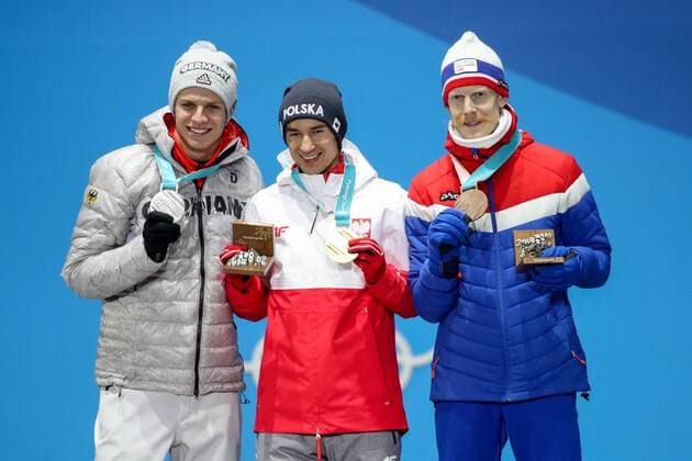 OLYMPICS - 2018 Winter Olympics PYEONGCHANG,SOUTH KOREA,18.FEB.18 - OLYMPICS, NORDIC SKIING, Ski jumping Skispringen Ski nordisch - Olympic Winter games Winterspiele Spiele Summer games PyeongChang 2018, Medals Plaza, large hill, men, award ceremony. Image shows Andrea Wellinger (GER), Kamil Stoch (POL) and Robert Johansson (NOR). Keywords: medals. GEPAxpictures xMaticxKlansek