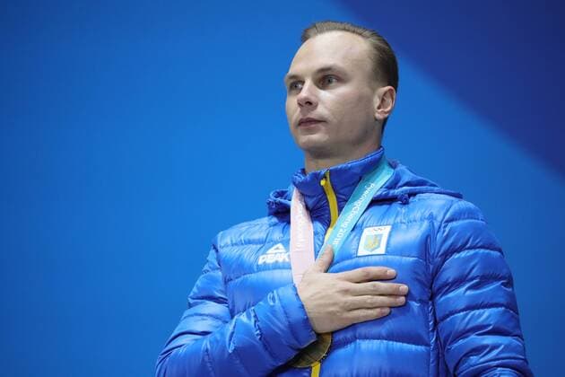 PYEONGCHANG, SOUTH KOREA â€“ FEBRUARY 19, 2018: Gold medallist Oleksandr Abramenko of Ukraine poses at a victory ceremony for the men s freestyle skiing aerials at the 2018 Winter Olympic Games Olympische Spiele Olympia OS Sergei Bobylev TASS  TS074A5E