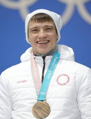 PYEONGCHANG, SOUTH KOREA â€“ FEBRUARY 19, 2018: Olympic Athlete from Russia Ilya Burov poses with his bronze medal at a victory ceremony for the men s freestyle skiing aerials at the 2018 Winter Olympic Games Olympische Spiele Olympia OS Sergei Bobylev TASS  TS074A76