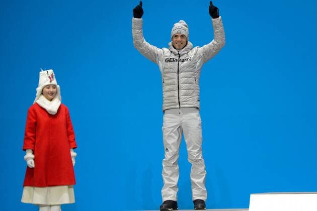 February 19, 2018 - Pyeongchang, South Korea - SIMON SCHEMPP of Germany celebrates getting the silver medal in the Men s 15km Mass Start biathlon event in the PyeongChang Olympic Games Olympische Spiele Olympia OS Pyeongchang 18: Medal Winners - ZUMAl132 20180219_zap_l132_004 Copyright: xChristopherxLevyx