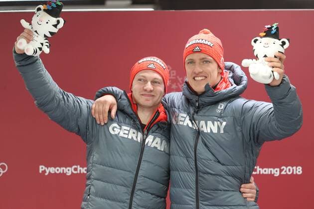 OLYMPICS - 2018 Winter Olympics PYEONGCHANG,SOUTH KOREA,19.FEB.18 - OLYMPICS, BOBSLEIGH - Olympic Winter games Winterspiele Spiele Summer games PyeongChang 2018, two-man, men, award ceremony. Image shows Francesco Friedrich and Thorsten Margis (GER). GEPAxpictures xMathiasxMandl
