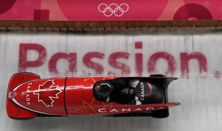 (180219) -- PYEONGCHANG, Feb. 19, 2018 -- Canada s Justin Kripps and Alexander Kopacz compete during 2-man event of bobsleigh at the 2018 PyeongChang Winter Olympic Games Olympische Spiele Olympia OS at Olympic Sliding Centre, PyeongChang, South Korea, Feb. 19, 2018. Justin Kripps and Alexander Kopacz claimed champion, together with Germany s Francesco Friedrich and Thorsten Margis, in a time of 3:16.86. ) (SP)OLY-SOUTH KOREA-PYEONGCHANG-BOBSLEIGH-2-MAN BaixXuefei 
