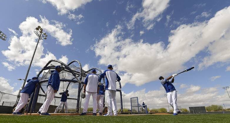 February 19, 2018 - Surprise, AZ, USA - Kansas City Royals Alcides Escobar, right, warms up before batting practice during Monday s spring training workout on Feb. 19, 2018 in Surprise, Ariz. Spring training - ZUMAm67_ 20180219_zaf_m67_040 Copyright: xJohnxSleezerx