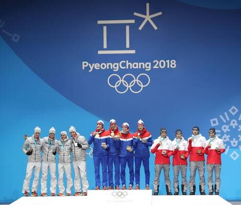 (180220) -- PYEONGCHANG, Feb. 20, 2018 -- Champion team Norway (C), second-placed team Germany (L) and third-placed team Poland celebrate during medal ceremony of men s team event of Ski jumping Skispringen Ski nordisch at 2018 PyeongChang Winter Olympic Games Olympische Spiele Olympia OS at Medal Plaza, PyeongChang, South Korea, Feb. 20, 2018. ) (SP)OLY-SOUTH KOREA-PYEONGCHANG-SKI JUMPING-MEN S TEAM-MEDAL CEREMONY WuxZhuang 