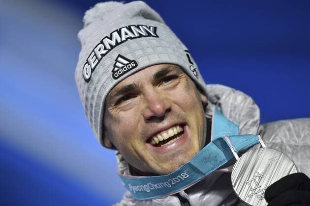 Simon SCHEMPP GER 2 square silver silver medal silver medal winner joy joy cheers emotion enthusiasm cheer 15 km mass start men mass start cheers biathlon men s victory ceremony PyeongChang Olympic medals Plaza ceremony on 19 02 2018 Olympic Winter Olympics 2018 from 09 02 25 02 2018 in PyeongChang Korea Â