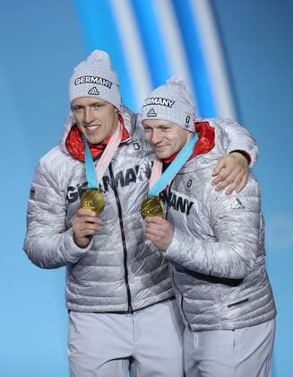(180220) -- PYEONGCHANG, Feb. 20, 2018 -- Gold medalists Germany s Francesco Friedrich (R) and Thorsten Margis pose for photos during medal ceremony of 2-man event of bobsleigh at the 2018 PyeongChang Winter Olympic Games Olympische Spiele Olympia OS at Medal Plaza, PyeongChang, South Korea, Feb. 20, 2018. ) (SP)OLY-SOUTH KOREA-PYEONGCHANG-BOBSLEIGH-2-MAN-MEDAL CEREMONY WuxZhuang 