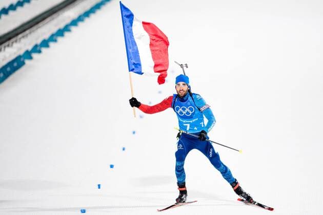 Themen der Woche - SPORT Olympia-Bilder des Tages - SPORT 180220 Martin Fourcade of France, gold, celebrates with the flag in the Biathlon Mixed Relay during day eleven of the 2018 Winter Olympics on February 20, 2018 in Pyeongchang. Photo: Carl Sandin BILDBYRAN kod CS 57999_309 *** 180220 Martin Fourcade of France gold celebrates with the flag in the Biathlon Mixed Relay during day eleven of the 2018 Winter Olympics on February 20 2018 in Pyeongchang Photo Carl Sandin BILDBYRAN code CS 57999 309  Copyright: CARLxSANDIN BB180220CS091