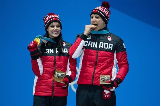 Ice Dance gold medalists Tessa Virtue and Scott Moir of Canada pose for a photo during the medals ceremony at Pyeongchang Medals Plaza in Pyeongchang, South Korea on February 20, 2018.  OLY20180220130 MATTHEWxHEALEY