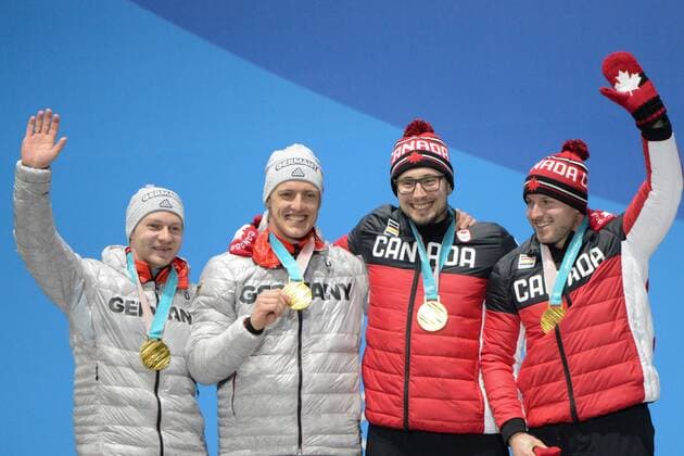 February 20, 2018 - Pyeongchang, South Korea - The German and Canadian 2- man bobsleigh teams celebrate winning the gold medal in the 2-man bobsleigh event in the PyeongChang Olympic Games Olympische Spiele Olympia OS .German team members are Francesco FRANCESCO and THORSTEN MARGIS..Canadians - JUSTIN KRIPPS and ALEXANDER KOPACZ Pyeongchang 18: Medal Winners - ZUMAl132 20180220_zap_l132_043 Copyright: xChristopherxLevyx