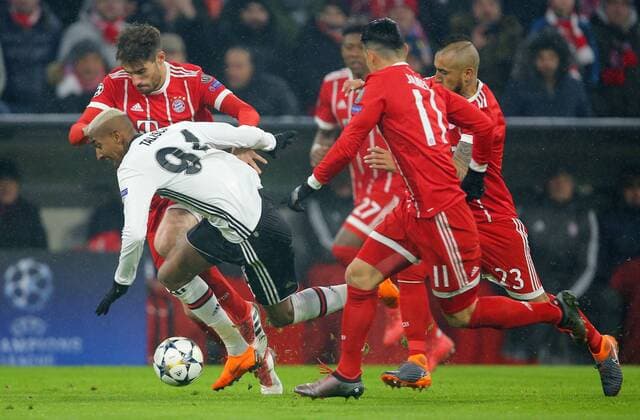 SOCCER - UEFA CL, Bayern vs Besiktas MUNICH,GERMANY,20.FEB.18 - SOCCER - UEFA Champions League, round of 16, FC Bayern Muenchen vs Besiktas Istanbul. Image shows Talisca (Besiktas), Javi Martinez, James Rodriguez and Arturo Vidal (Bayern). GEPAxpictures xThomasxBachun