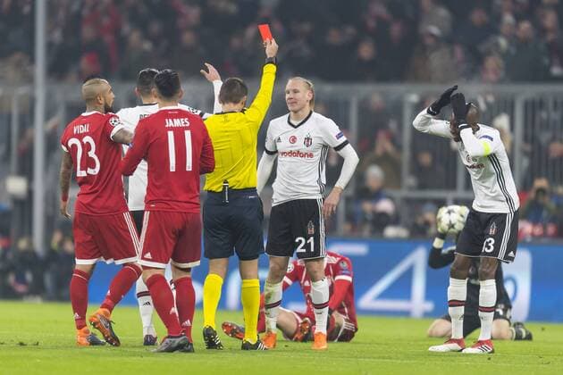 GER UEFA CL Bayern Munich GER vs Besiktas Istanbul TUR 20 02 2018 Allianz Arena Munich GER UEFA CL Bayern Munich GER vs Besiktas Istanbul TUR eighths final pictured red map for Domagoj Vida Besiktas 21 with Robert Lewandowski FCB 9 Arturo Vidal FCB 23 James FCB 11 nordphotox xStraubmeier nph00004